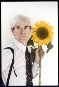 Andy Warhol Holding a Sunflower